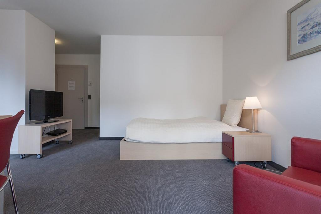Ema House Serviced Apartments Seefeld Zurique Quarto foto